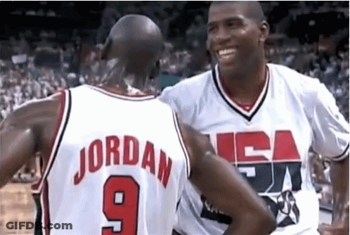 Two Basketball Players One Of Whom Has The Number 9 On His Back GIF