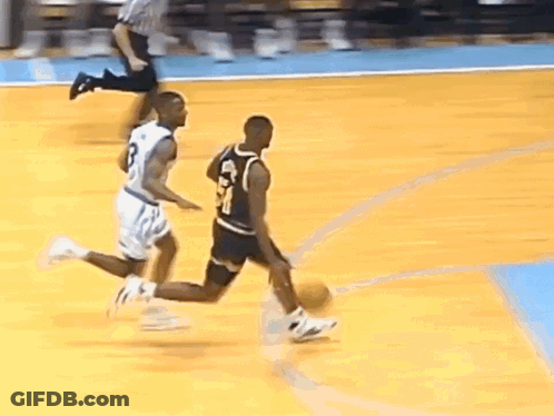 Two Basketball Players Playing On Court GIF