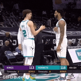 Two Basketball Players Talking GIF