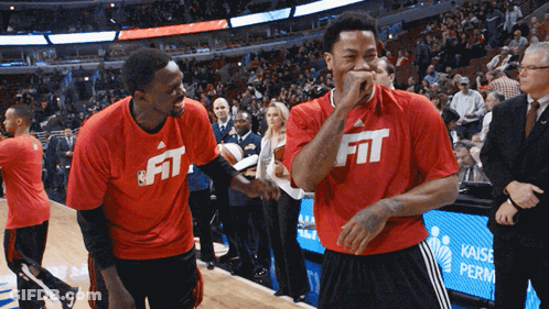 Two Basketball Players Wear Red Shirts That Say Fit GIF