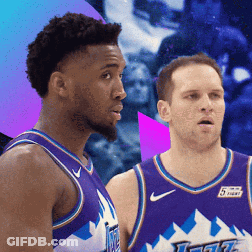 Two Basketball Players Wearing Purple Jerseys With The Number 5 On Them GIF