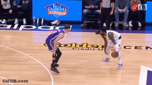 Two Basketball Players With Blue Diamond Almonds Ad GIF