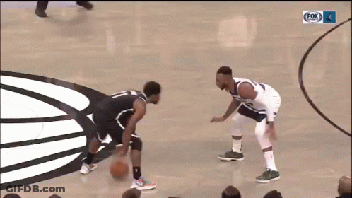 Two Basketball Players With Fox Logo GIF