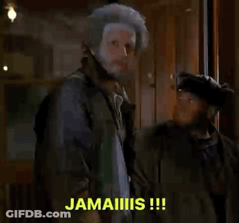 Two Bearded Men In Hats Standing Together GIF