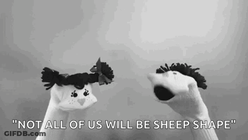 Two Black And White Sock Puppets With Quote GIF
