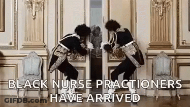 Two Black Nurse Practitioners Standing GIF