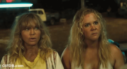 Two Blonde Women Looking At Something GIF