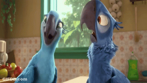 Two Blue Cartoon Birds Standing Together GIF