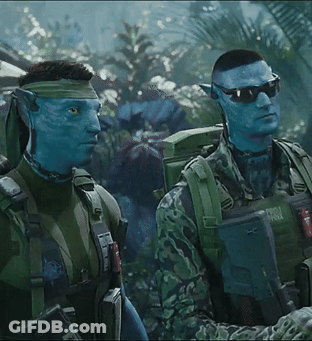 Two Blue-Faced Soldiers One With Army Vest GIF