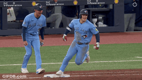 Two Blue Jays Baseball Players Celebrate Home Run GIF