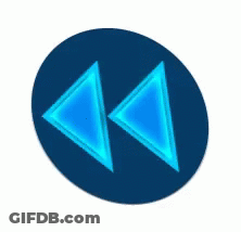 Two Blue Triangles Are Glowing In The Dark In A Blue Circle . GIF