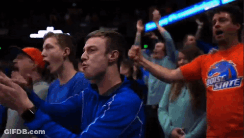 Two Boston Basketball Players High Five GIF