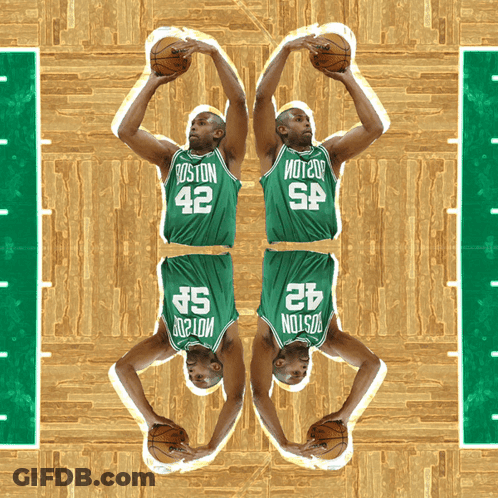 Two Boston Celtics Players Holding Basketballs GIF