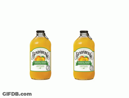 Two Bottles Of Bundaberg Tropical Mango Sitting Next To Each Other On A White Background GIF