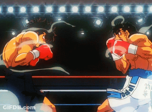 Two Boxers Are Fighting In A Ring And One Of Their Shorts Has The Word Ippo On It GIF