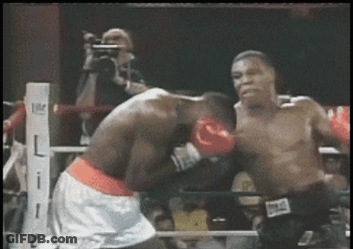 Two Boxers Fighting In Ring GIF