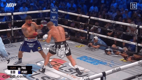 Two Boxers Fighting In Ring GIF