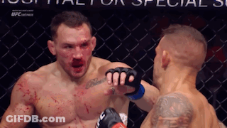 Two Boxers Fighting One Bloodied GIF