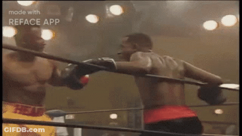 Two Boxers Fighting One Wearing Red Belt GIF