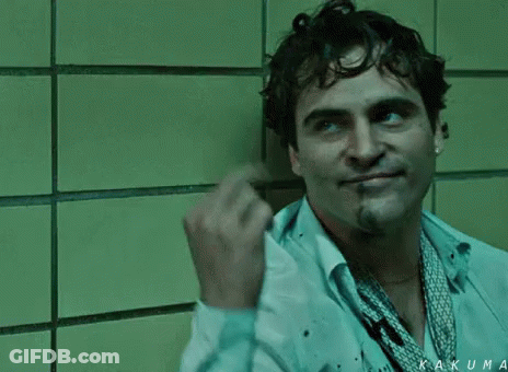 Two Boxers Fighting, One With Back Tattoo GIF