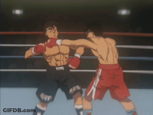 Two Boxers Fighting, One With Number 1 Shorts GIF