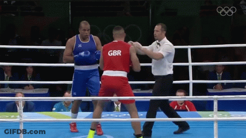 Two Boxers In A Ring One Of Whom Is Wearing A Gbr Uniform GIF