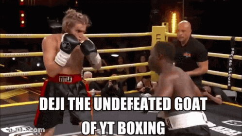 Two Boxers In Ring Saying Deji The Undefeated Goat Of YT Boxing GIF