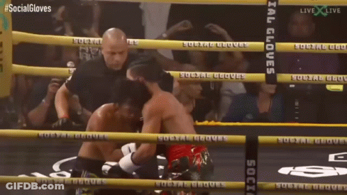 Two Boxers In Ring With Social Gloves On Ropes GIF