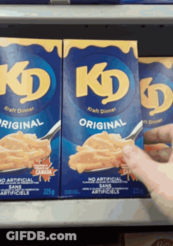 Two Boxes Of Kd Original Kraft Dinner Are On A Shelf GIF