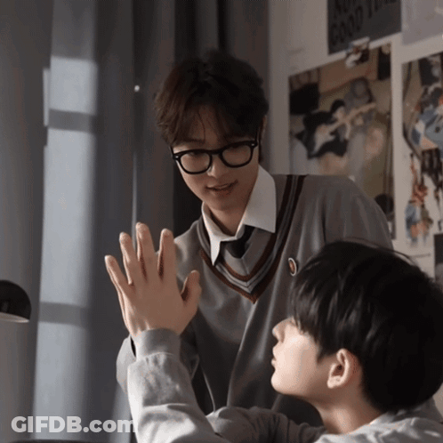 Two Boys Are Giving Each Other A High Five In Front Of A Poster That Says " No Good Times " GIF