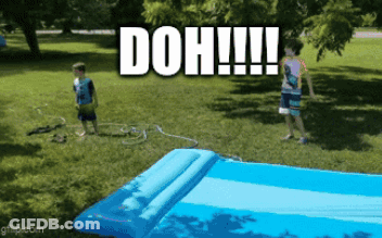Two Boys Are Playing With A Water Slide That Says Doh On It GIF