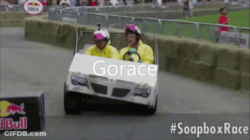 Two Boys Driving Toy Cars On Street Viralhog GIF