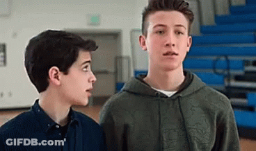 Two Boys In Gym Looking At Each Other GIF