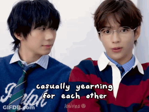 Two Boys In Sweaters And Ties Casually Yearning For Each Other GIF