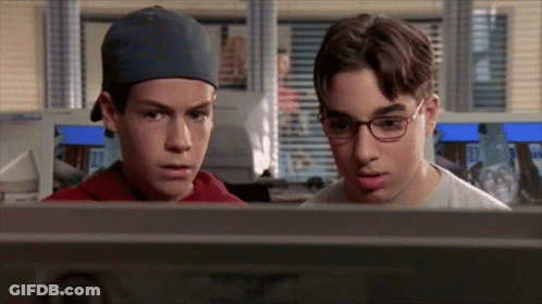 Two Boys Looking At Computer Screen GIF