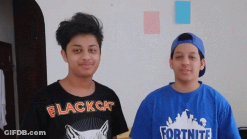 Two Boys One In Black Cat Shirt And One In Fortnite Shirt GIF