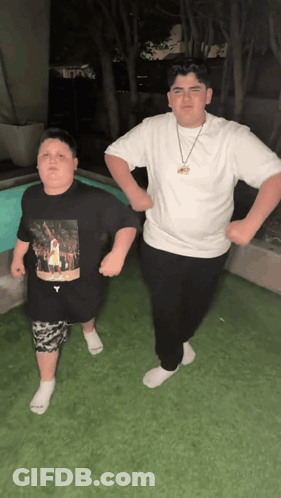 Two Boys One Wearing Kobe Bryant Shirt GIF