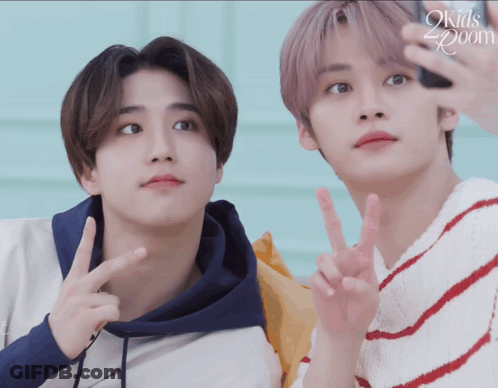 Two Boys Posing One In Kids Room Sweater GIF