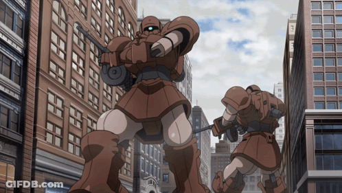 Two Brown Robots Standing In Front Of A.C. Sign GIF