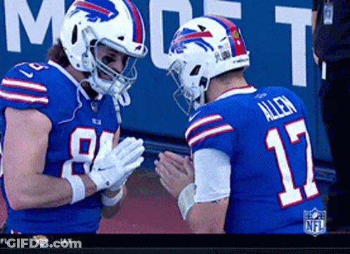 Two Buffalo Bills Football Players Are Clapping Hands GIF