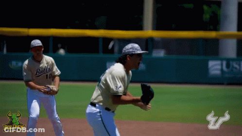 Two Bullpen Baseball Players On The Field With A Bullpen Logo In The Background GIF