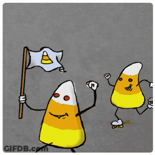 Two Candy Corn Characters Holding Flag And Rollerblading GIF