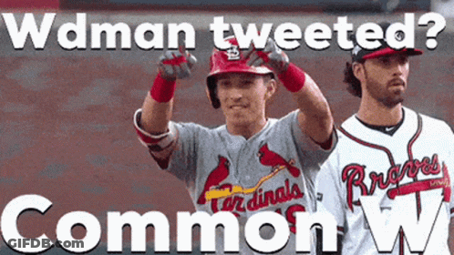 Two Cardinals Baseball Players Standing Next To Each Other GIF