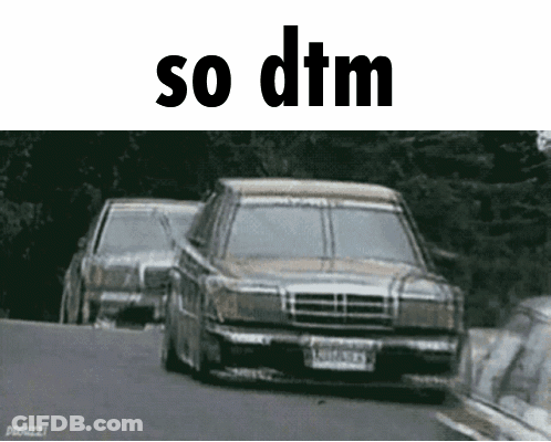 Two Cars Are Driving Down A Road With The Words So Dtm Written Above Them GIF