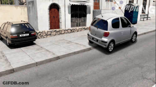 Two Cars Are Parked On The Side Of The Road And One Of Them Has A License Plate That Says Mcx GIF
