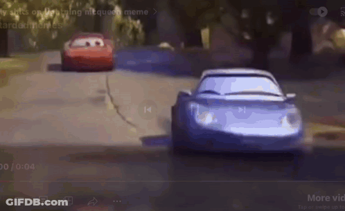 Two Cars Are Racing Down A Road In A Cartoon . GIF