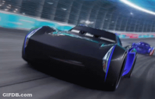 Two Cars Are Racing On A Race Track And One Has The Word Jackson Storm On The Front GIF