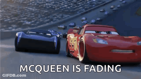 Two Cars Are Racing On A Race Track With The Words Mcqueen Is Fading GIF