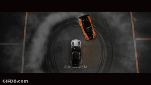 Two Cars Drifting With Smoke GIF
