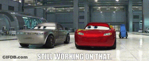 Two Cars In Garage With Still Working On That GIF